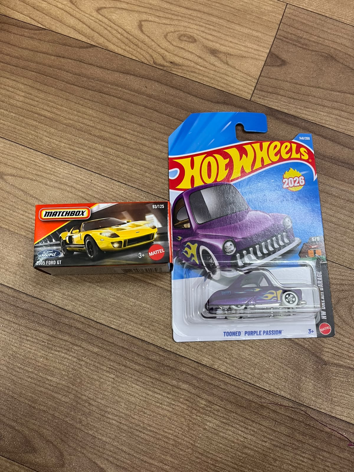 2005 FORD GT(MATCHBOX CAR) AND TOONED PURPLE PASSION HOTWHEELS SINGLE CAR