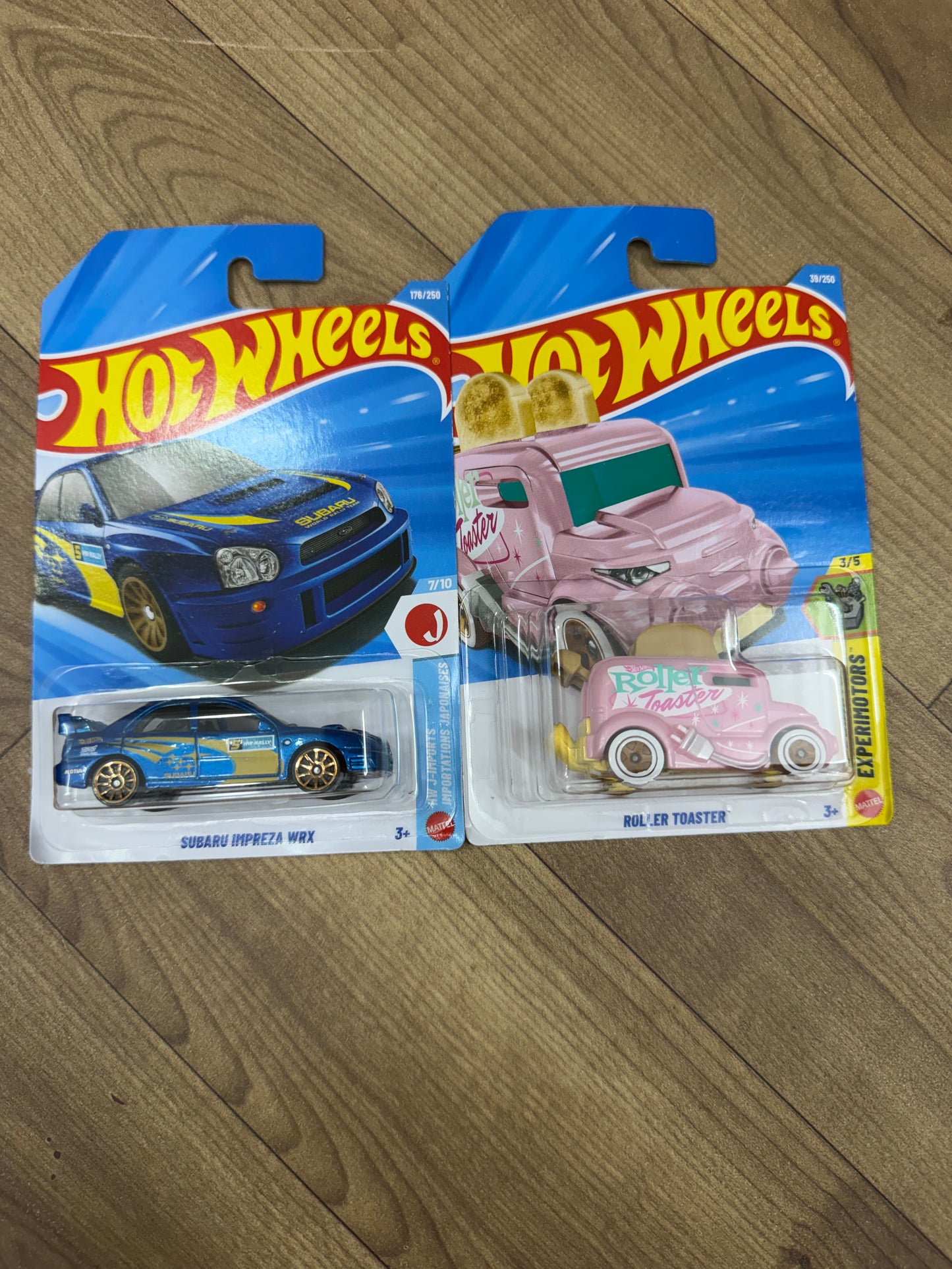 SINGLE HOTWHEELS CAR- SUBARU IMPERA WRX AND ROLLER TOASTER