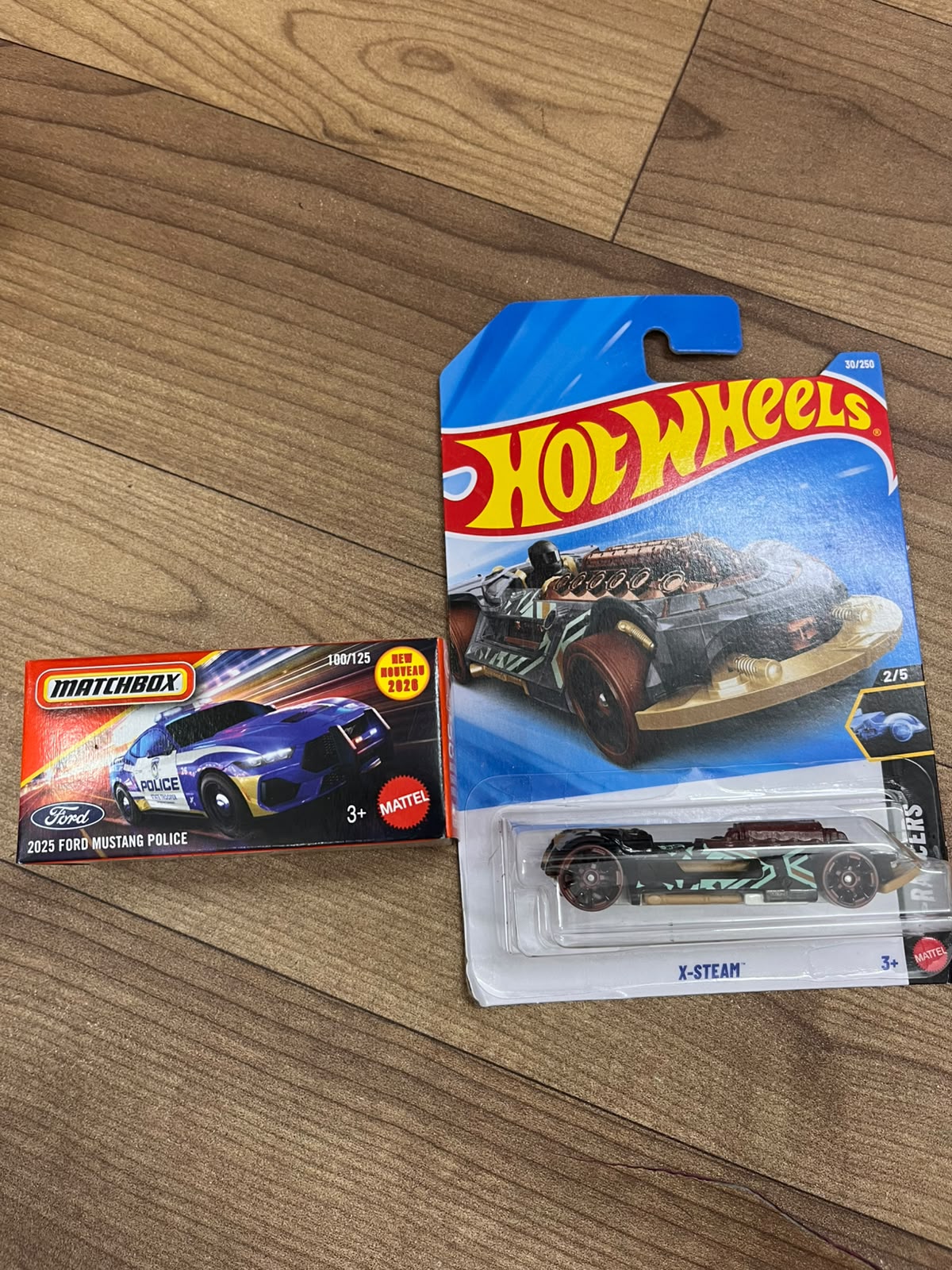 2025 FORD MUSTANG POLICE(MATCHBOX CAR) AND X STEAM HOTWHEELS SINGLE CAR