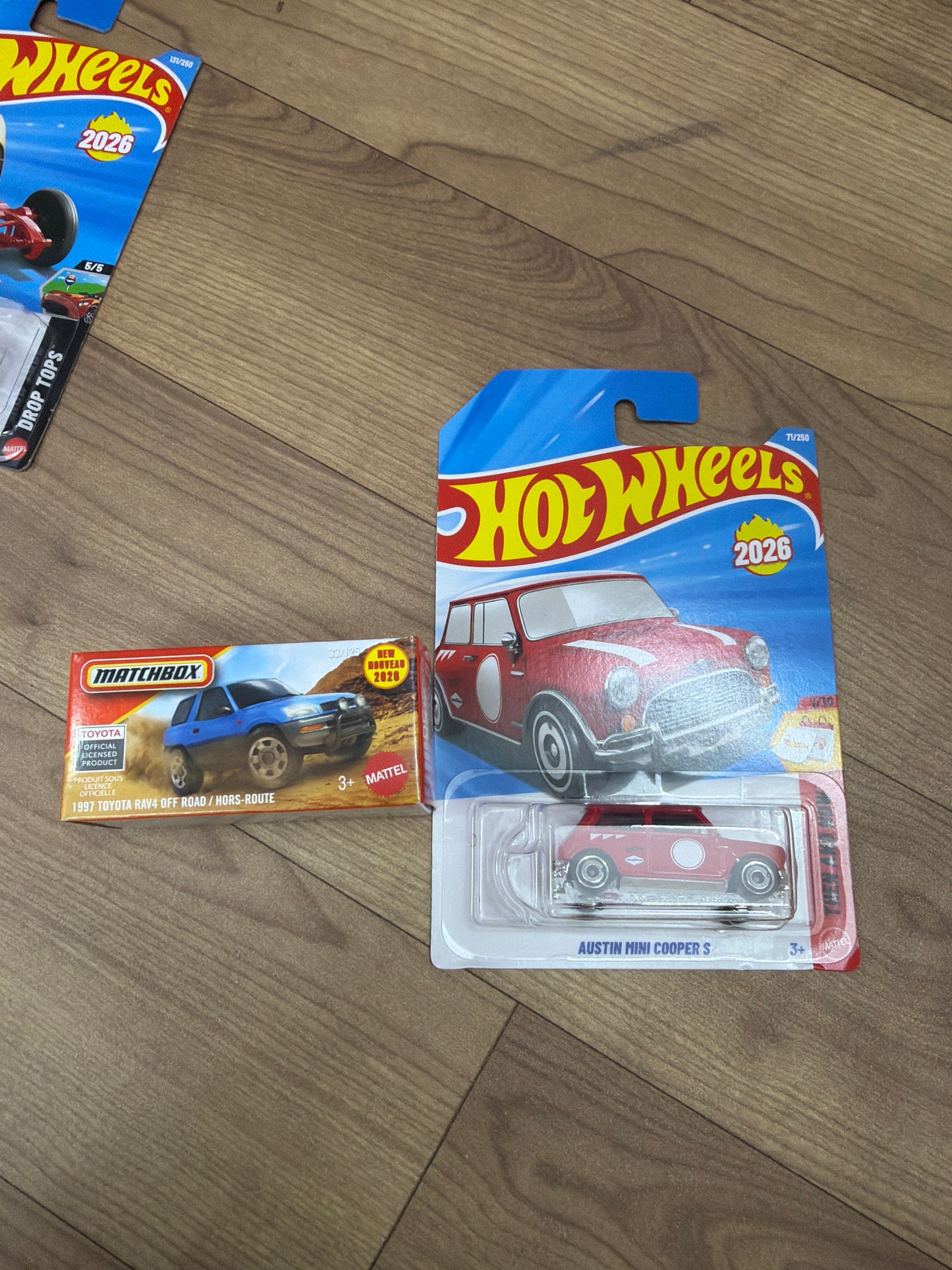SINGLE HOT WHEELS CAR AUSTIN MINI COOPER S and DNK70 (MATCHBOX PWR GBRS HERITAGE)- 2023 TOYOTA RAV4 TRD