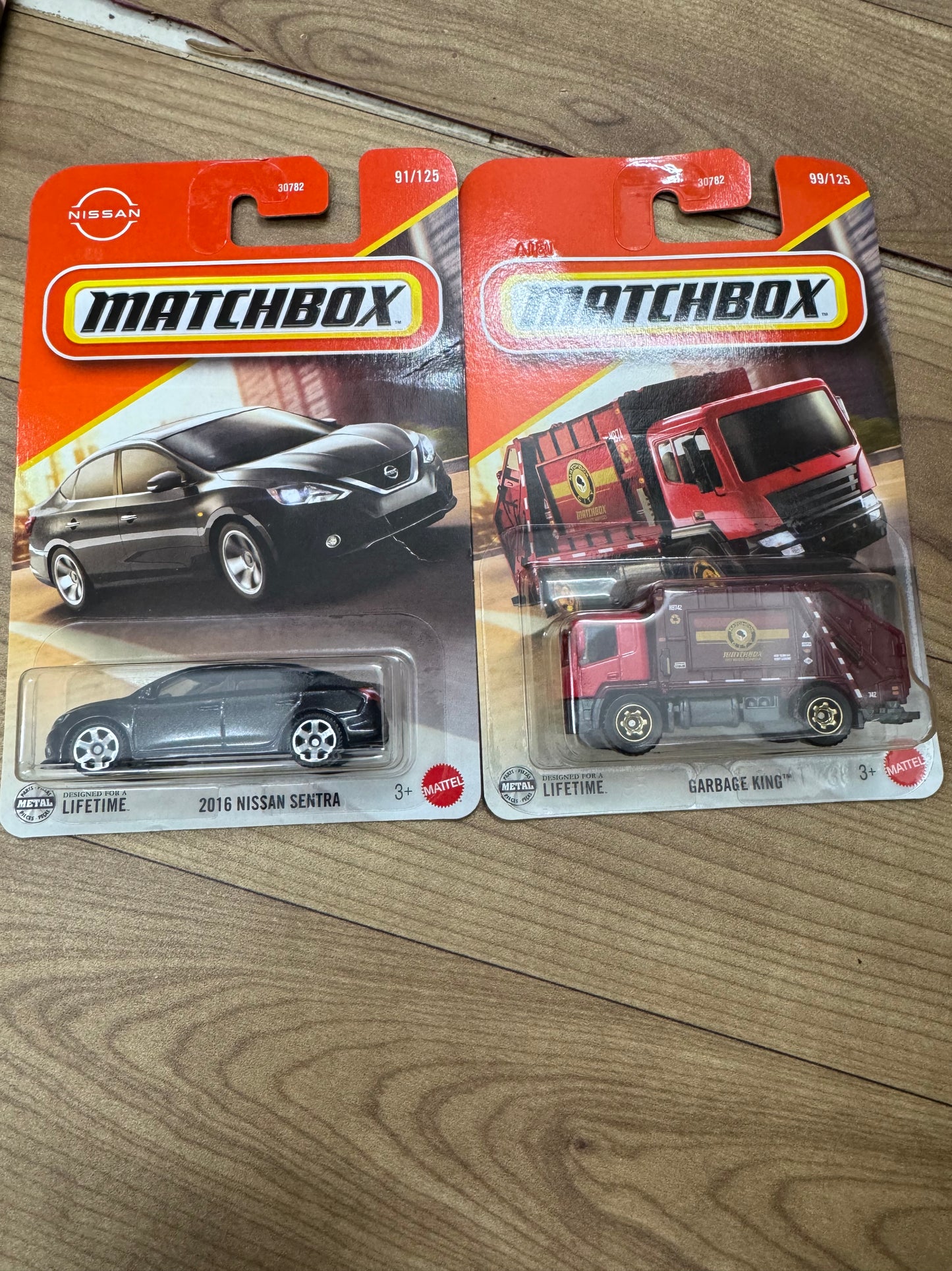 MATCHBOX 2016 NISSAN SENTRA AND MATCHBOX GARBAGE KING