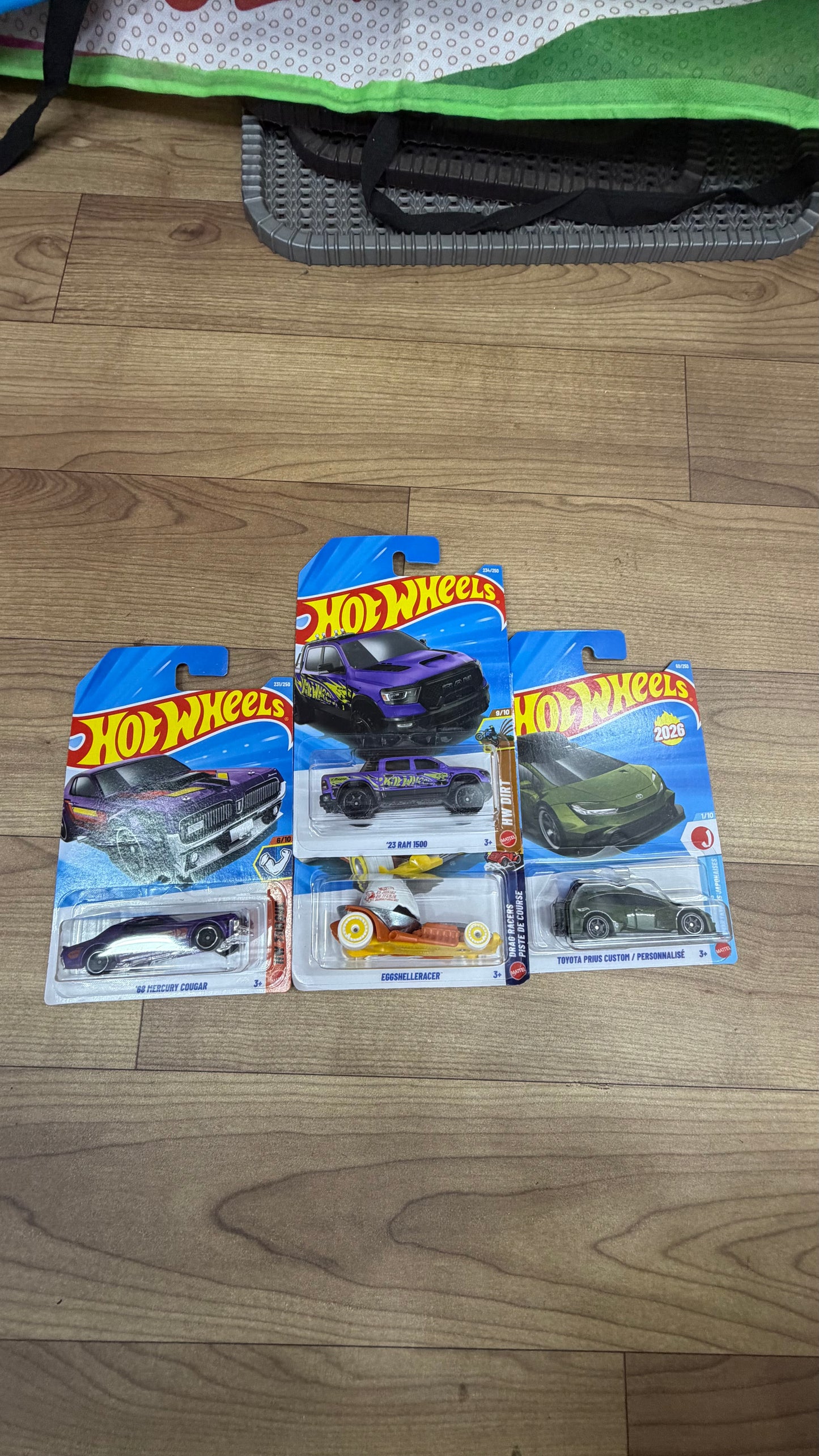 23 RAM 1500 and EGGSHELLERACER and TOYOTA PRIUS CUSTOM and 68 MERCURY COUGAR- SINGLE HOTWHEELS