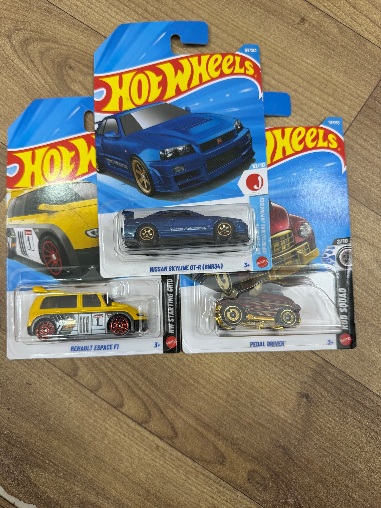 SINGLE HOTWHEELS CAR- NISSAN SKYLINE GT-R (BNR34) AND PEDAL DRIVER AND RENAULT ESPACE F1