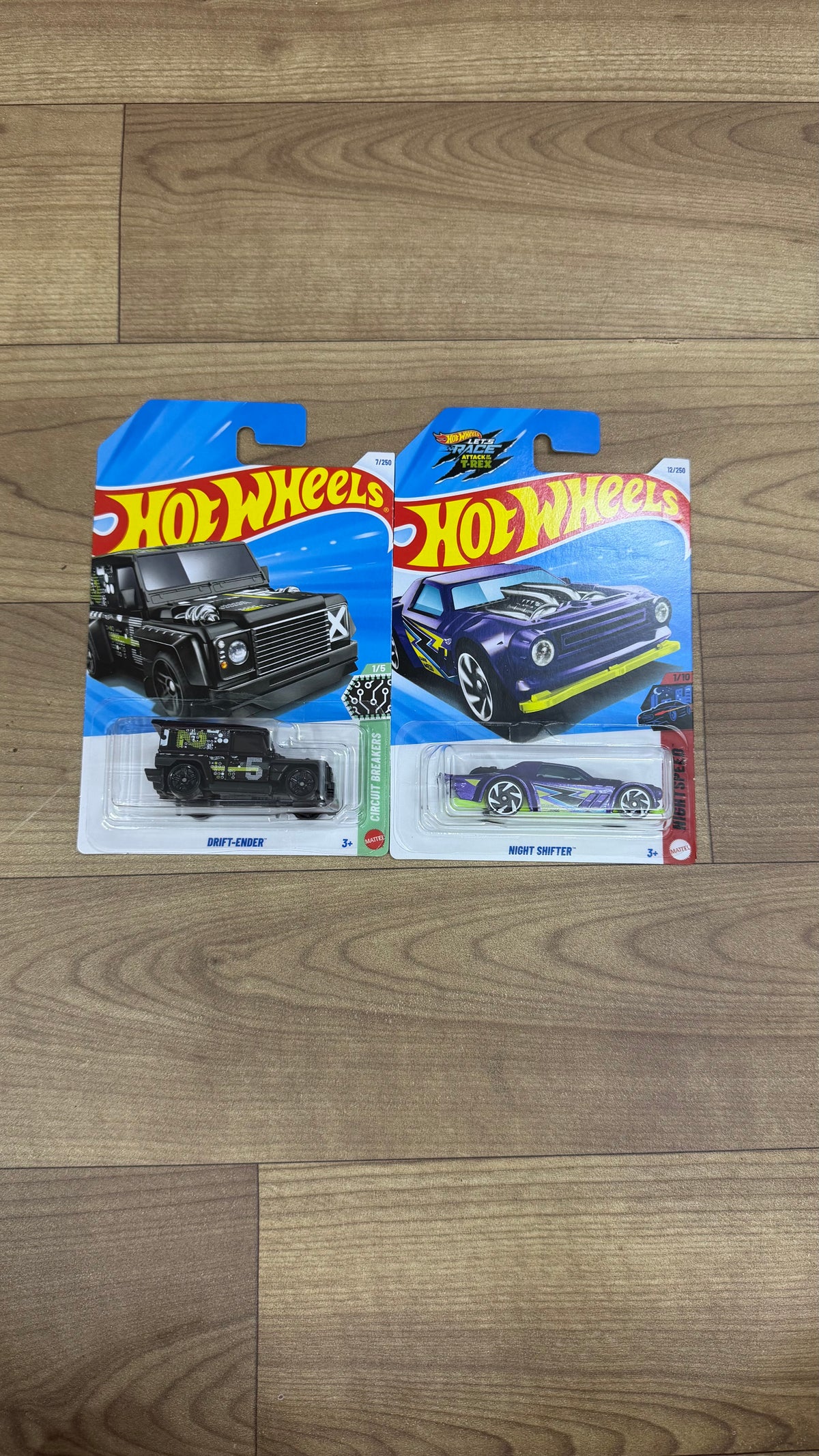 DRIFT- ENDER- A CASE OF 2027 SINGLE HOTWHEELS CAR AND NIGHT SHIFTER- A CASE OF 2027 SINGLE HOTWHEELS CAR