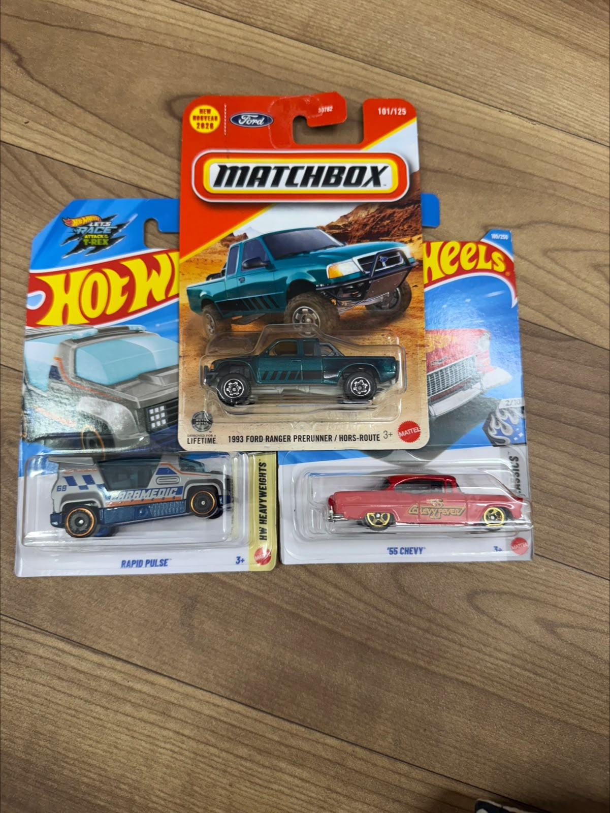 1993 FORD RANGER PRERUNNER (MATCHBOX CAR- 30782) AND 55 CHEVY (SINGLE HOTWHEELS CAR) AND RAPID PULSE (SINGLE HOTWHEELS CAR)