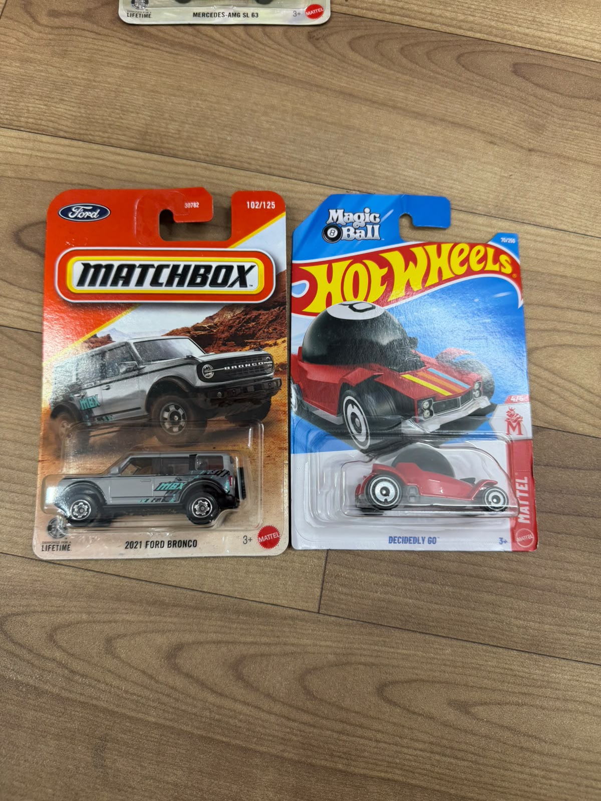 2021 FORD BRONCO (MATCHBOX CAR- 30782) AND DECIDELY GO (SINGLE HOTWHEELS CAR)
