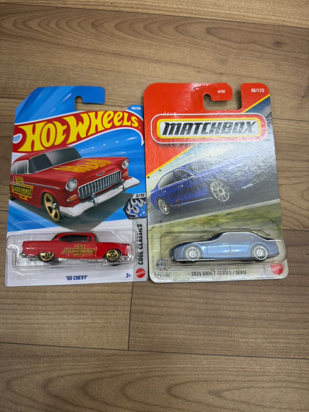2024 BMW 7-SERIES (MATCHBOX CAR- 30782) AND 55 CHEVY (SINGLE HOTWHEELS CAR)