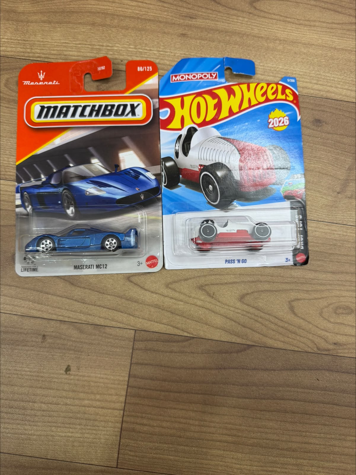 MASERATI MC 12 (MATCHBOX CAR- 30782) AND PASS N GO WHITE (SINGLE HOTWHEELS CAR)