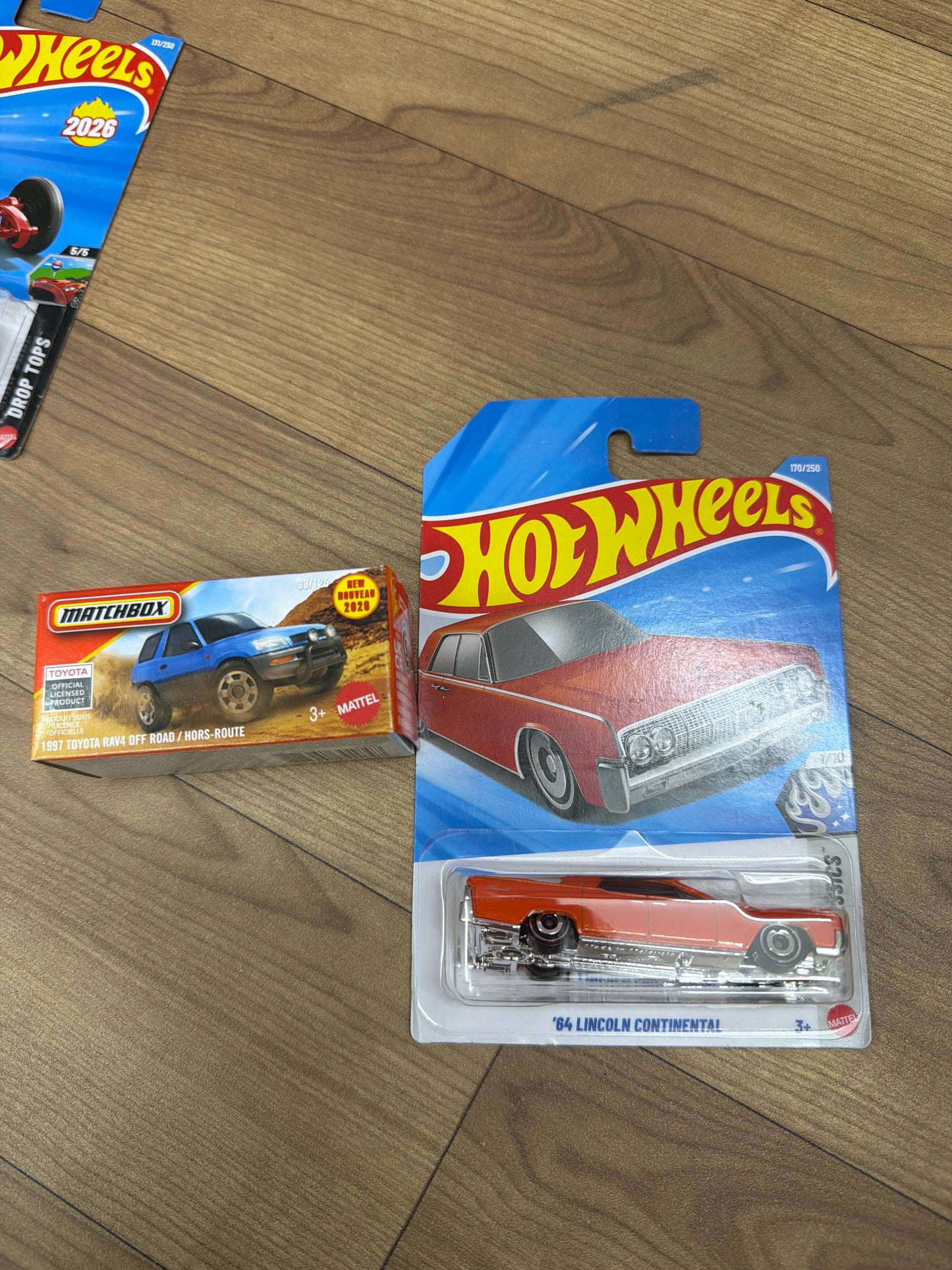 SINGLE HOT WHEELS CAR 64 LINCOLN CONTINENTAL and DNK70 (MATCHBOX PWR GBRS HERITAGE)- 2023 TOYOTA RAV4 TRD