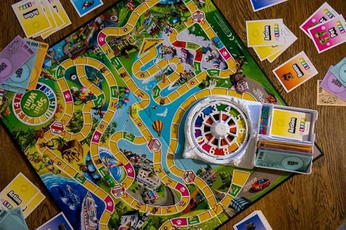 The Game of Life Game, Family Board Game for 2 to 4 Players, for Kids Ages 8 and Up, Includes Colorful Pegs, Multicolour