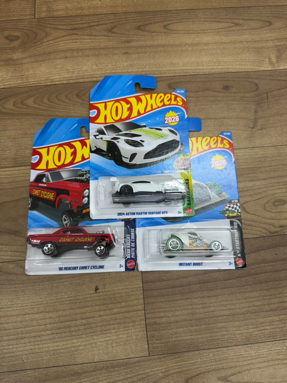 2024 ASTON MARTIN VANTAGE GT3 AND INSTANT BOOST- GREEN AND 65 MERCURY COMET CYCLONE: SINGLE HOT WHEELS CARS