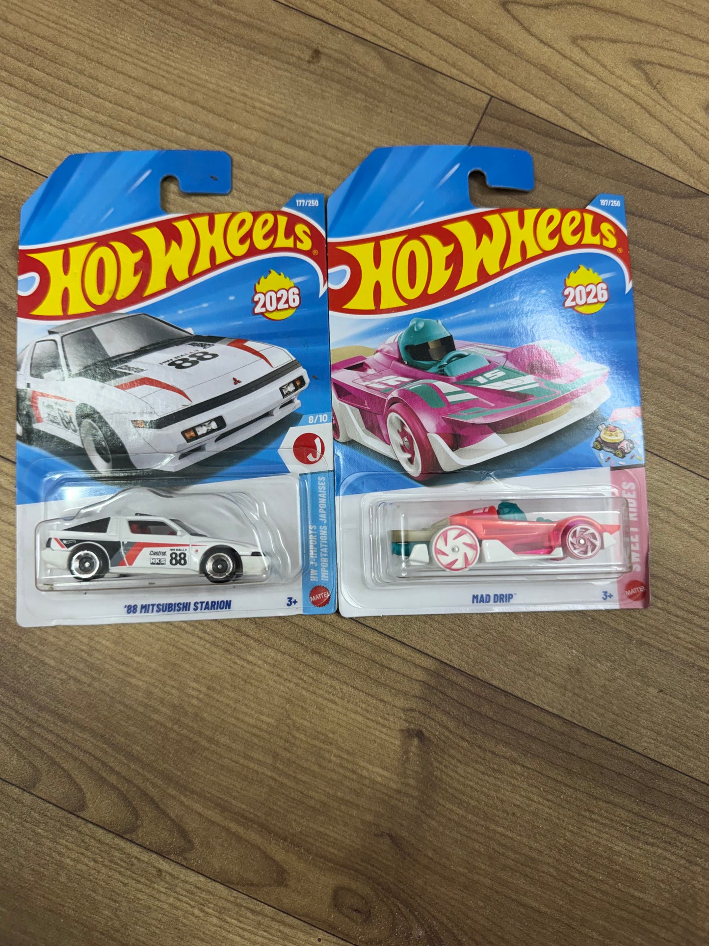 SINGLE HOTWHEELS CAR- 88 MITSUBISHI STARION AND MAD DRIP