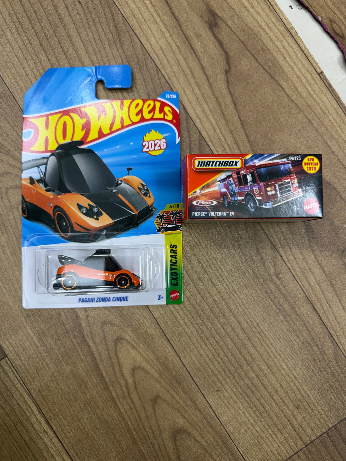 SINGLE HOT WHEELS CAR PAGANI ZONDA CINQUE and  PIERCE VOLTERRA