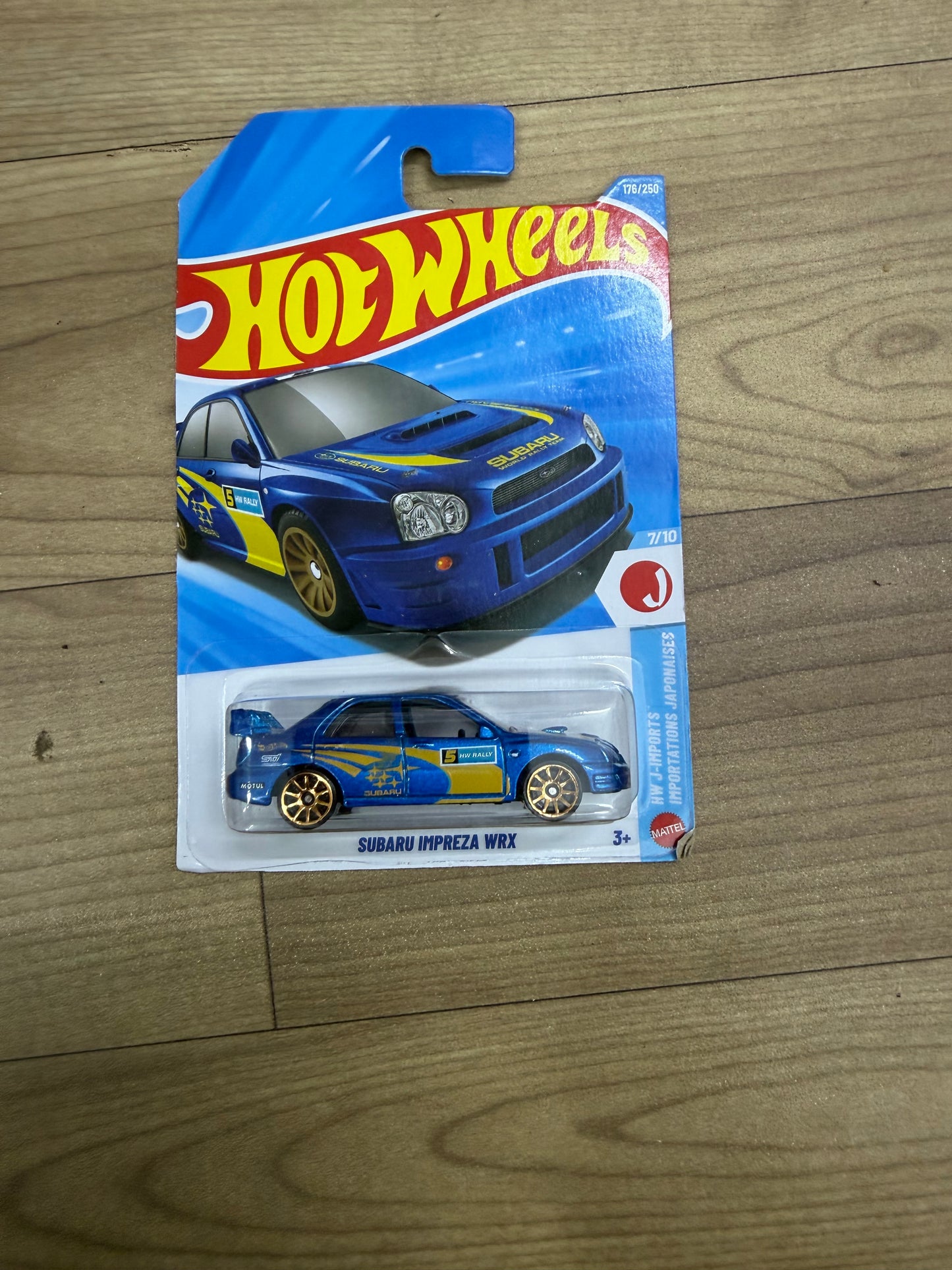 SINGLE HOTWHEELS CAR- SUBARU IMPERA WRX