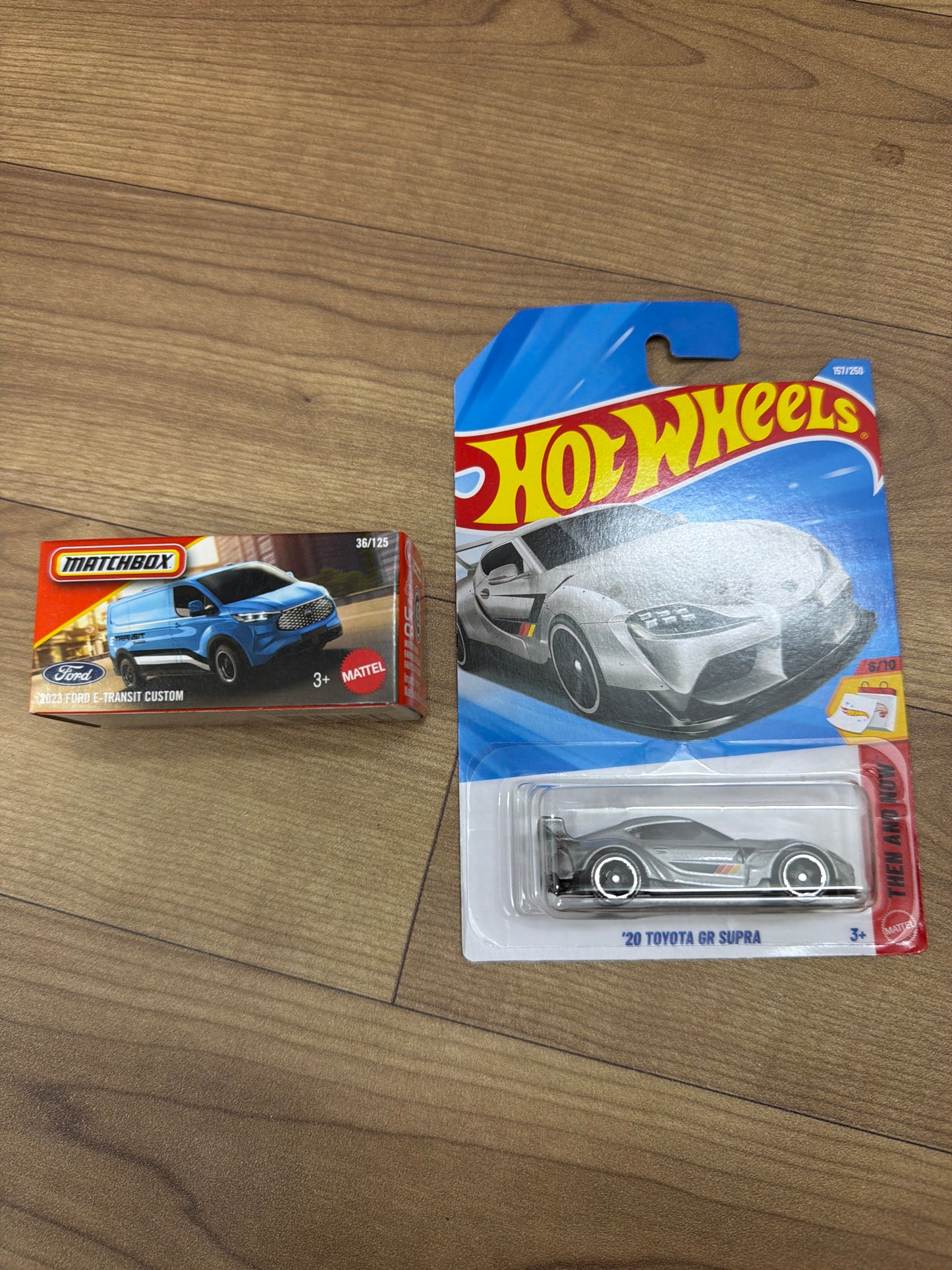 SINGLE HOT WHEELS CAR 20 TOYOTA GR SUPRA and MATCHBOX DKN70- 2023 FORD E- TRANSIT CUSTOM