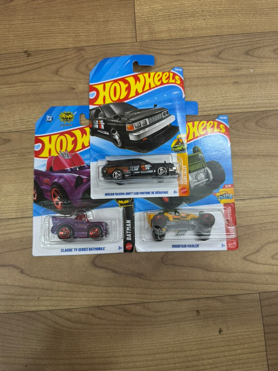 NISSAN MAXIMA DRIFT CAR AND CLASSIC TV SERIES BATMOBILE AND MOUNT HAULER: SINGLE HOT WHEELS