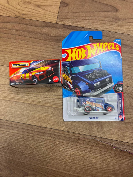BMW i4 POLICE(MATCHBOX CAR) AND MAILED IT HOTWHEELS SINGLE CAR