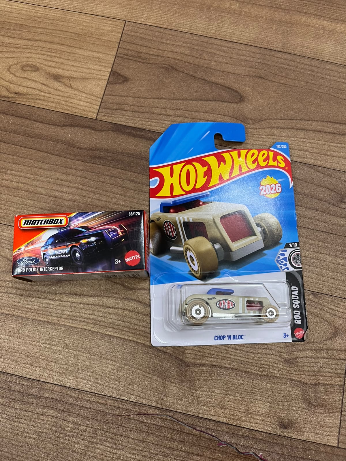 FORD POLICE INTERCEPTOR(MATCHBOX CAR) AND CHOP N BLOC HOTWHEELS SINGLE CAR